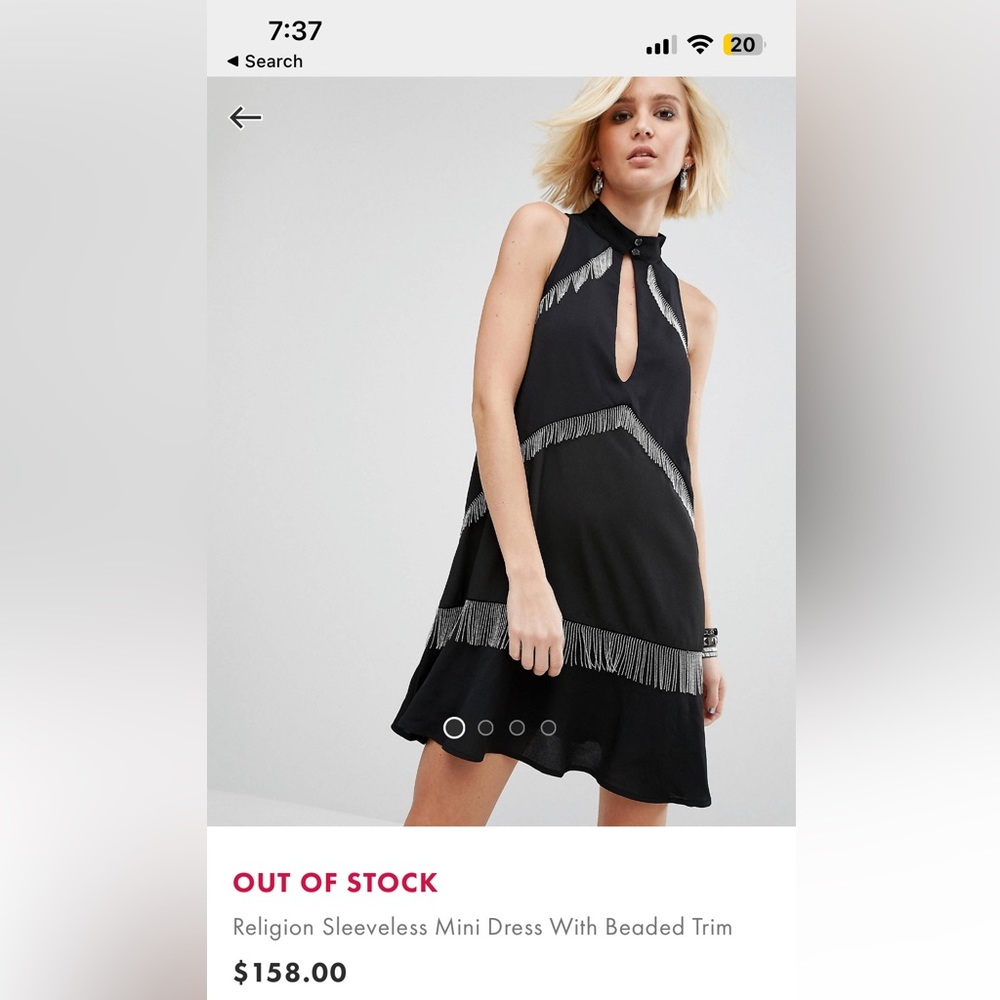 Black shift dress with beaded tassels
